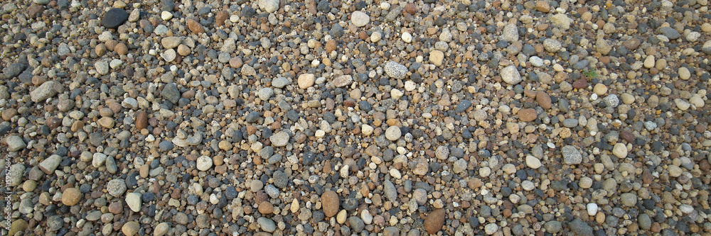 Small colorful pebbles and gravel background
Small colorful pebbles and gravel background