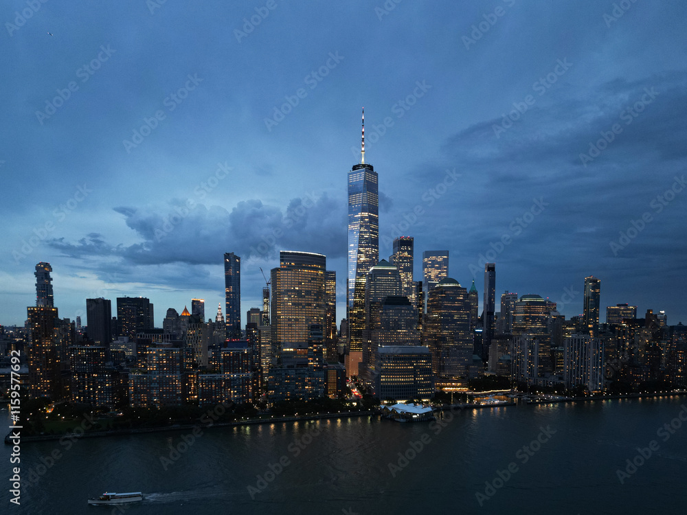 Obraz premium NYC aerial night view. New York City skyline, cityscape of Manhattan in USA. New York City NYC Manhattan Downtown Skyline, from Jersey City USA.
