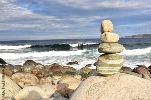 Rolling waves on a rocky beach. The coast of the Barents Sea
