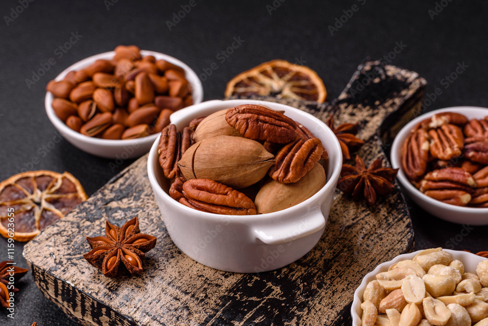 Delicious nutritious pecan nuts in ceramic bowl Delicious nutritious pecan nuts in ceramic bowl