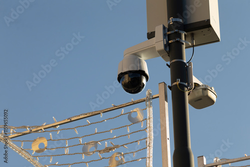 Canvastavla Surveillance cameras are securely mounted high on a tall pole at outdoor area