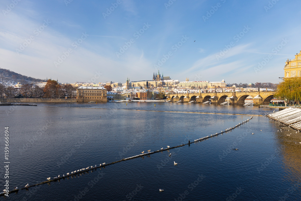 Snowy Prague Lesser Town with Prague Castle above River Vltava, Czech republic