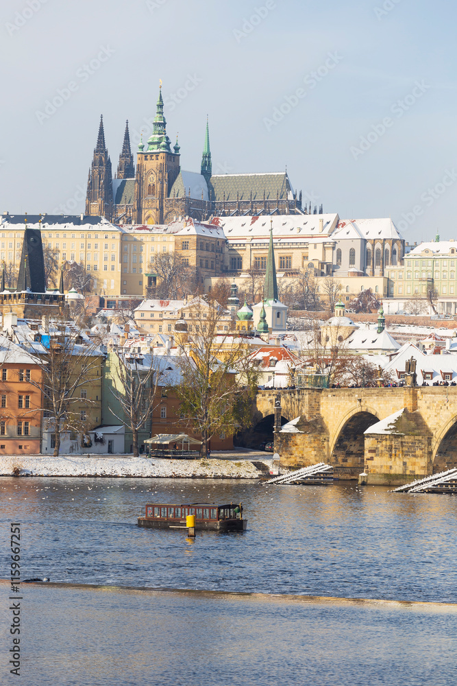 Snowy Prague Lesser Town with Prague Castle above River Vltava, Czech republic