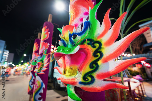 Huge incense sticks with dragon heads in front of Clan Jetty temple in Georgetown, Penang, Malaysia photo