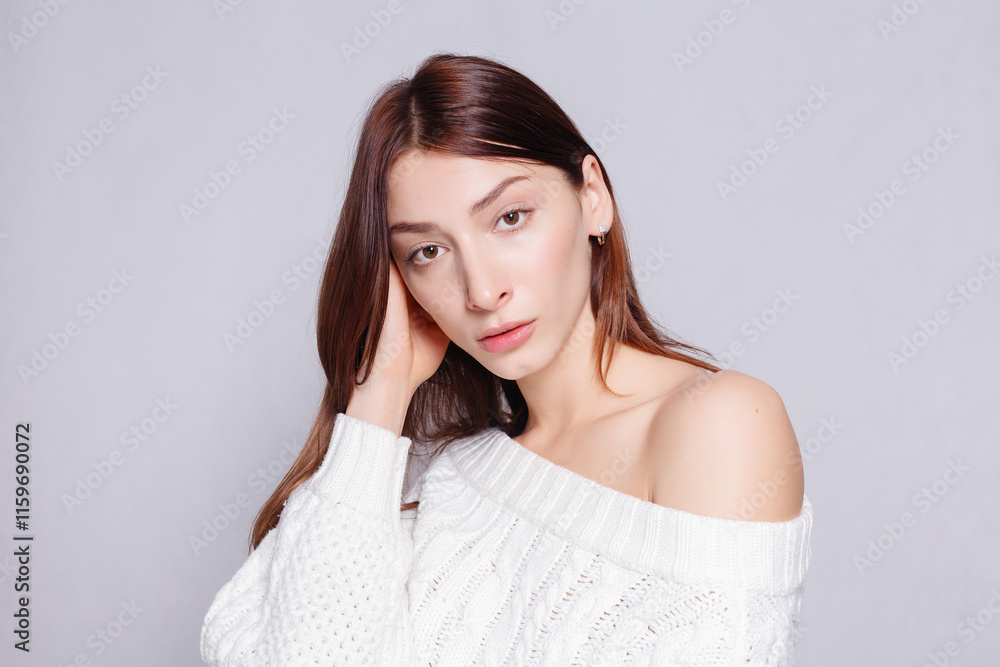 Beautiful woman face close up portrait young studio on gray Beautiful woman face close up portrait young studio on gray