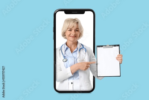 Mature female doctor with c...