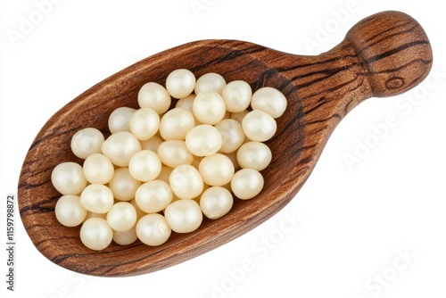 Close up of white Job s tears in a wooden scoop on a white background aerial view photo