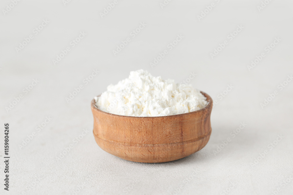 Bowl of powder pigment on light background Bowl of powder pigment on light background