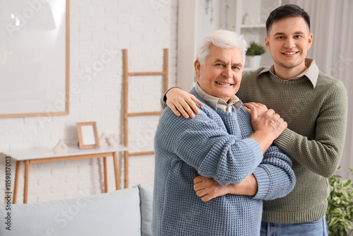 Young man with his father h...
