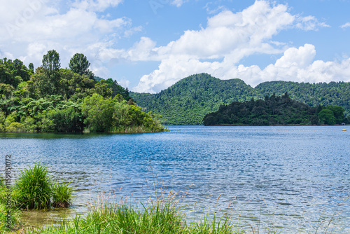 Native forests surround the picturesque Lake Okareka in New Zealand’s North Island. photo