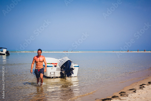 man on the Armona beach in Algarve  photo