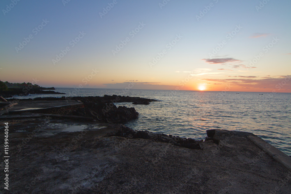 view of the sunset near seashore at moroni Island in Comores view of the sunset near seashore at moroni Island in Comores