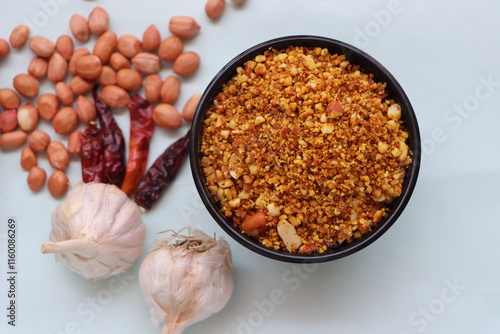 Shengdana chutney, Dry peanut garlic chutney made from red chilly and groundnut and garlic which is famous in maharashtra, spicy peanut crunch, Indian traditional food photo