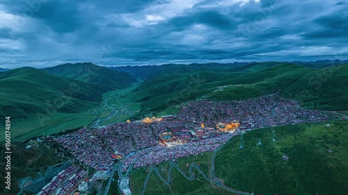 Evening panoramic time lapse of Serta Buddhist Institute showcasing tranquil beauty in Ganzi, Western Sichuan photo