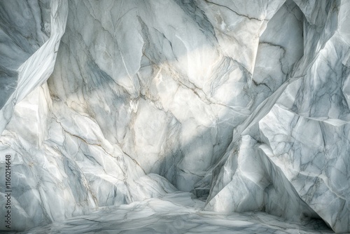 Stunning marble rock formations illuminated by soft natural light in a cavernous setting photo