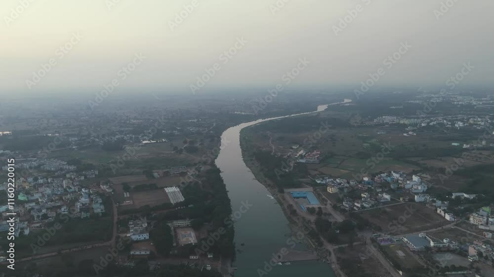 Scenic view of Kharun River and Mahadevghat temples, Riverside view with temples and suspension bridge, Kharun River aerial shot near Mahadevghat temples, Aerial perspective of Mahadevghat Stock Video Scenic view of Kharun River and Mahadevghat temples, Riverside view with temples and suspension bridge, Kharun River aerial shot near Mahadevghat temples, Aerial perspective of Mahadevghat Stock Video