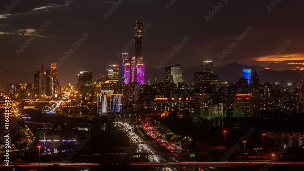 Nighttime traffic flows through Beijing's central business district with stunning city skyline views Nighttime traffic flows through Beijing's central business district with stunning city skyline views