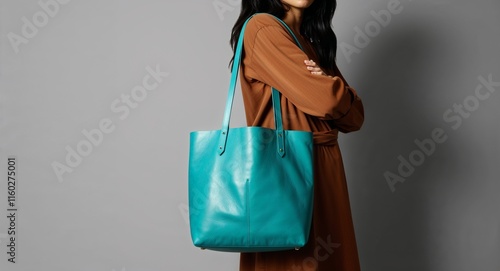Wallpaper Mural Turquoise leatherette tote bag on plain black background Torontodigital.ca