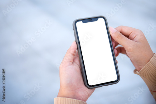 Close-up view Young man's hand holding a smartphone with a blank screen