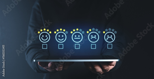 Fotografía Customer satisfaction feedback concept with digital rating icons over tablet