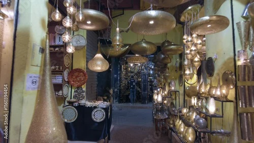 Africa, Morocco, Marrakech 12,29,2024 walking in the traditional suk, souk market inside the Medina in Jemaa el fna square heritage world , tourist attraction destination , lamps and lighting