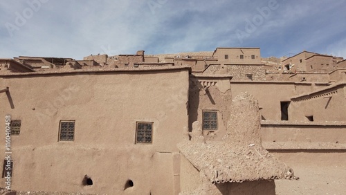 Africa, Morocco 12,29,2024 The KASBAH of Ait Ben Haddou  is a fortified city near Ouarzazate  . Ait Ben Haddou is a great example of earthen clay architecture , tourist visiting attraction destination photo