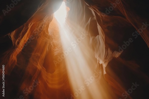 A cave with a light shining through it