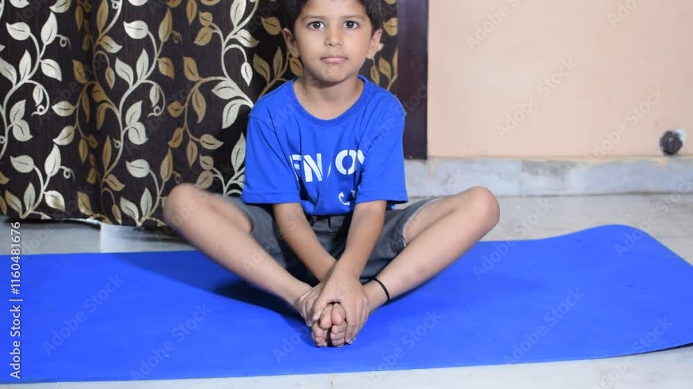 Asian smart kid doing yoga pose indoor, Children's yoga pose. The ...