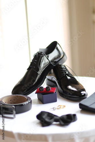 Still Life of Men's Formal Wear: Dress Shoes, Belt and Cufflinks for a Wedding
