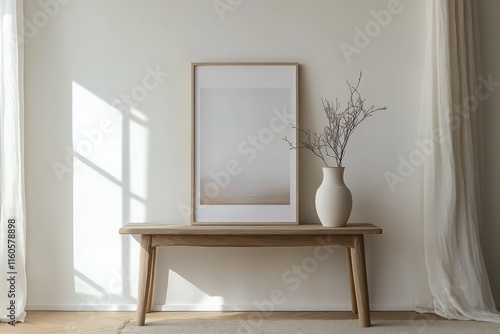 photograph of a simple, rectangular picture frame in the format 70 x 100 cm in front of a white wall, oak, narrow edge, the picture frame is empty. photo