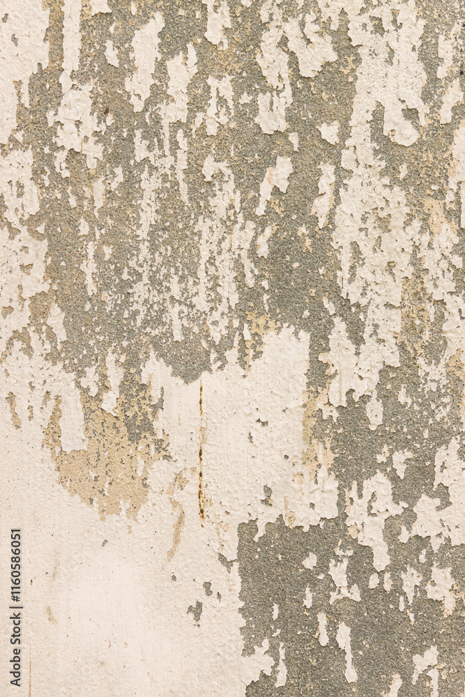 Obraz premium Grungy weathered concrete wall with cracks and stains, exuding a raw, aged texture background