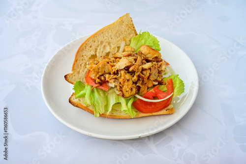 Meat Chicken Doner, between bread (Turkish Name : ekmek arasi et doner, tavuk doner, Gobit ekmek arasi, Turk kebabi)