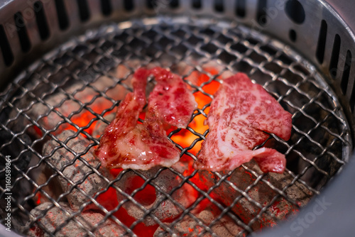 Premium marbled texture wagyu A5 beef steak Japanese restaurant yakiniku grilled on stove