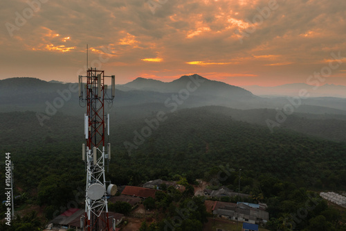 Transmission tower with sunrise sky background