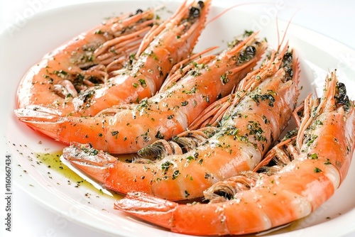 Fresh seafood dish with succulent shrimp served on a clean white plate garnished with parsley for a pop of color and flavor photo