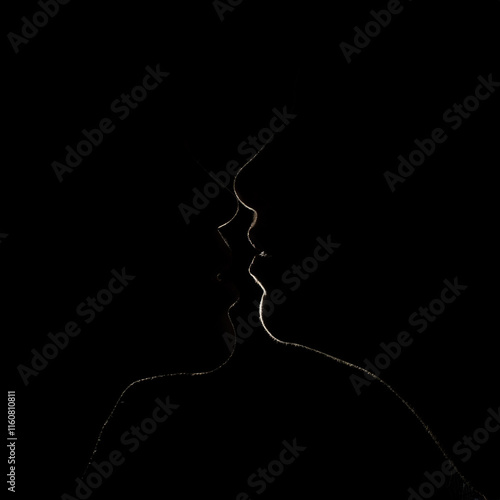 two girls kissing dark low key