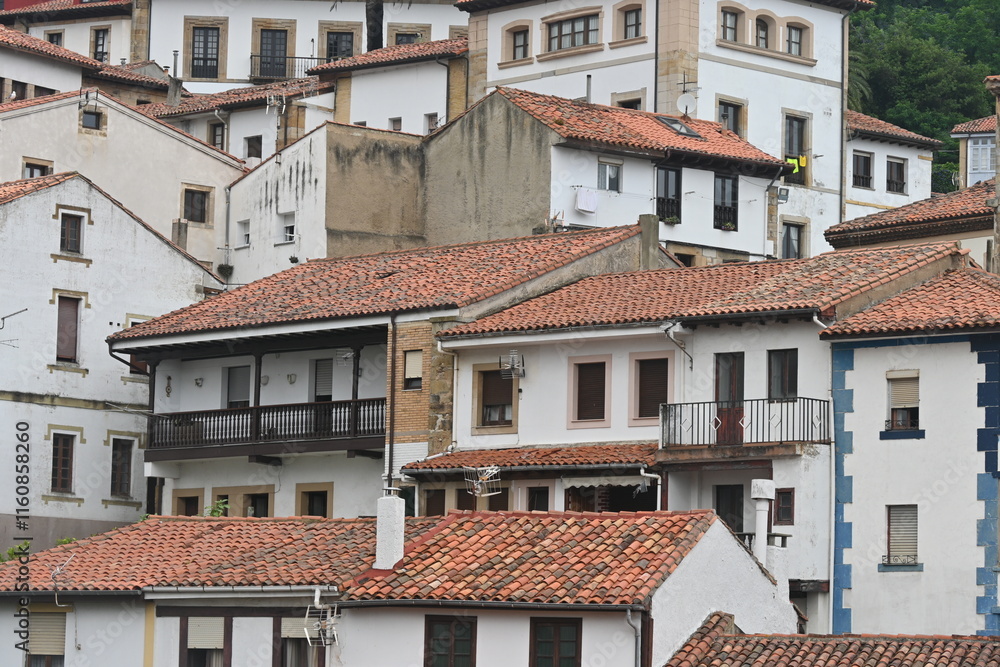 Moody brown roofs in Spanish coast beautiful town Moody brown roofs in Spanish coast beautiful town