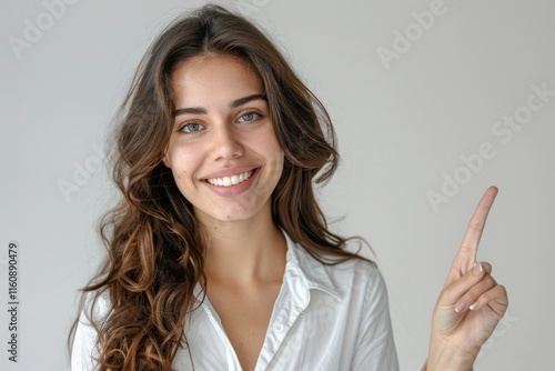 Wallpaper Mural Smiling brunette businesswoman pointing finger at camera. Torontodigital.ca