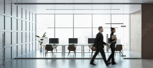 Canvas Print Modern office workspace with glass walls, desks, and computers