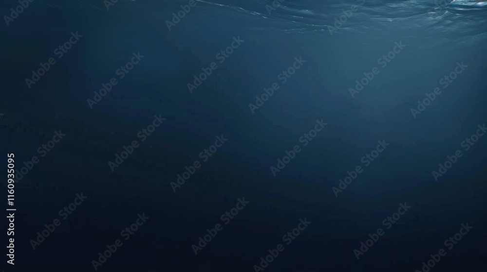 Obraz premium Deep, dark ocean water surface view from below.