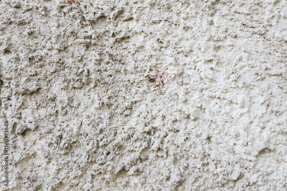 Old, rough plaster close-up on the wall. Old, rough plaster close-up on the wall.