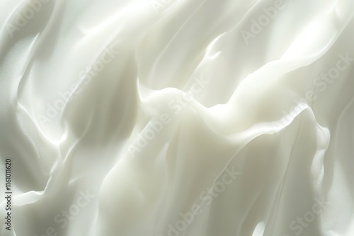 close-up of creamy white moisturizer texture with soft light reflections and faint shadows