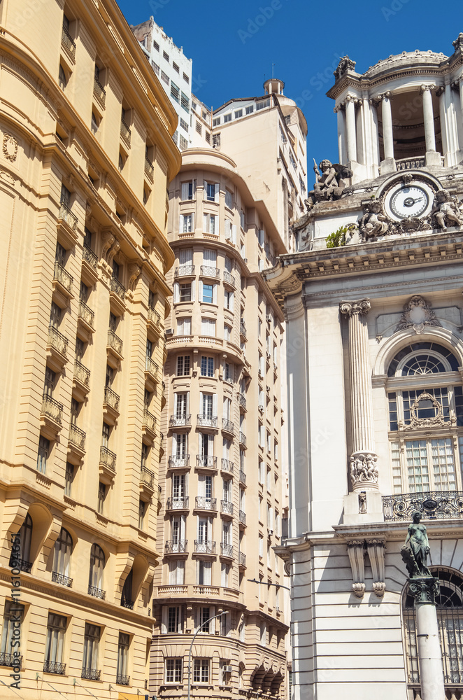 Obraz premium Brazil In Rio de Janeiro, historic and modern buildings coexist under a clear blue sky, showcasing urban evolution.