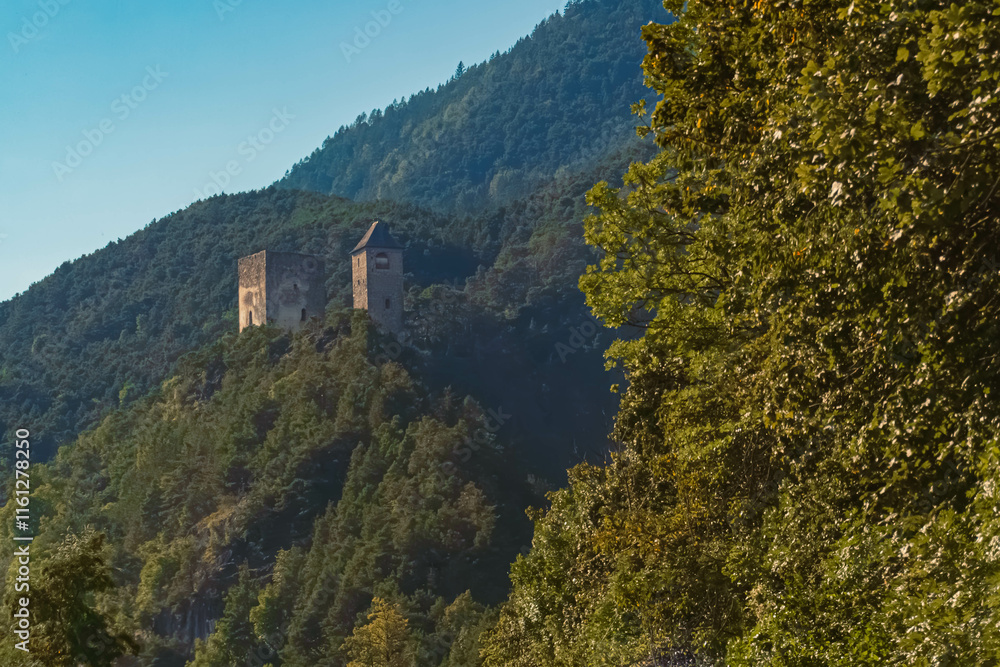 Alpine summer view with an old fortress at Zirl, Telfs, Innsbruck, Tyrol, Austria Alpine summer view with an old fortress at Zirl, Telfs, Innsbruck, Tyrol, Austria