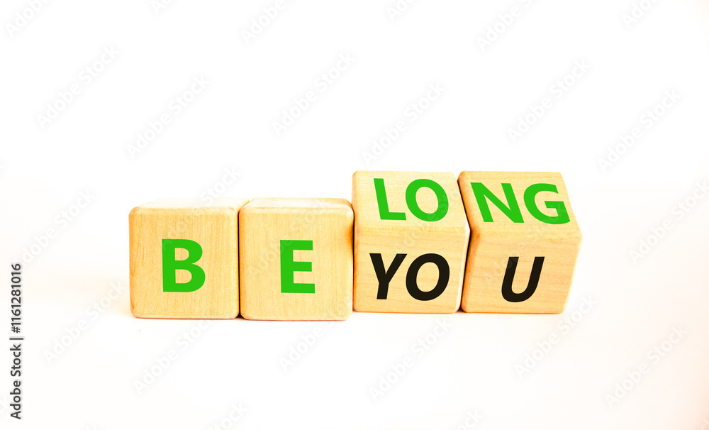 Belonging and belong symbol. Concept words Be you Belong on beautiful wooden block. Beautiful white table white background. Business motivational belonging and belong concept. Copy space. Belonging and belong symbol. Concept words Be you Belong on beautiful wooden block. Beautiful white table white background. Business motivational belonging and belong concept. Copy space.