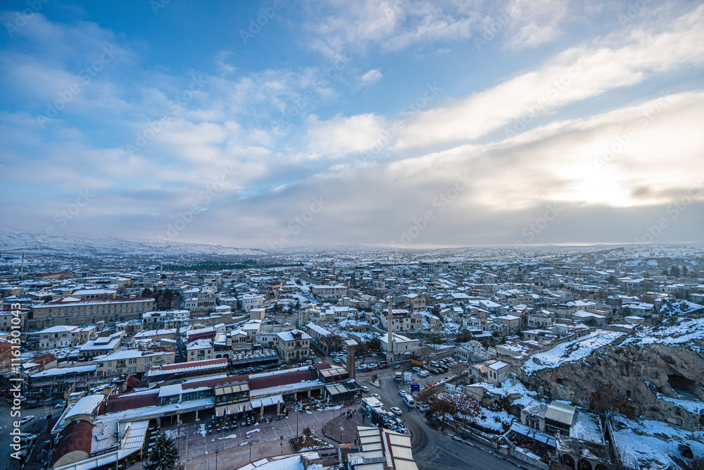 The scenic views of Ürgüp from Temenni Hill, which is located in the center of Ürgüp. Revealing the city panorama with its height of 80 meters, this rocky hill, can be seen from all over Ürgüp. The scenic views of Ürgüp from Temenni Hill, which is located in the center of Ürgüp. Revealing the city panorama with its height of 80 meters, this rocky hill, can be seen from all over Ürgüp.