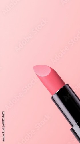 Elegant Pink Lipstick Glamorously Displayed on a Soft Pink Background Highlighting Beauty and Luxury in a Chic and Stylish Cosmetic Presentation photo