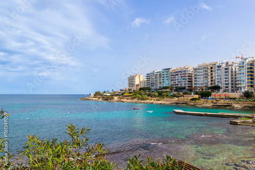 Sliema, Malta - February 11, 2024: Panoramic seafront view of Sliema from Exiles bay