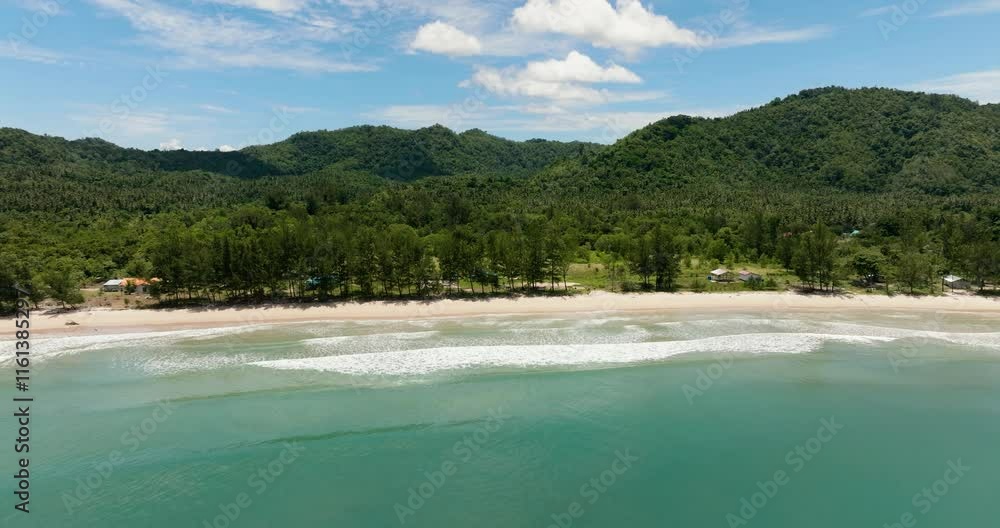 Coastline with beautiful sandy beach and blue sea view from above. Sabah, Borneo, Malaysia. Coastline with beautiful sandy beach and blue sea view from above. Sabah, Borneo, Malaysia.