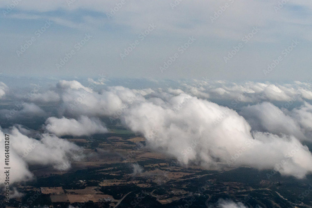 Fototapeta premium Hill Country, Texas, USA - An aerial view of clouds over the farmlands of Central Texas near Austin